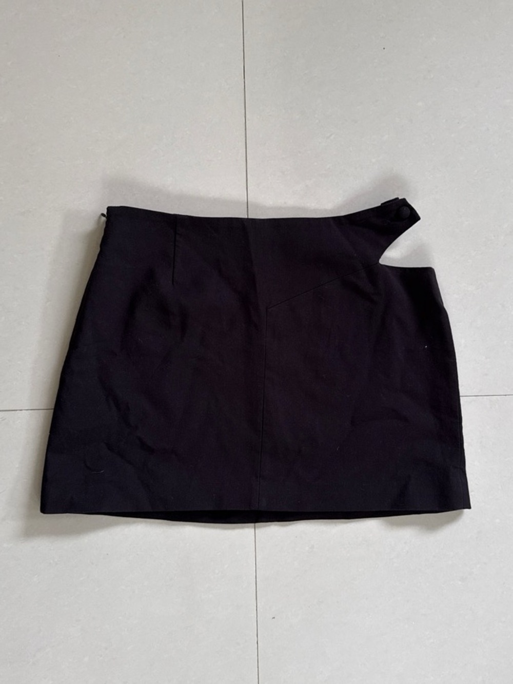 Black Mini Skirt with Asymmetric Cutout Waist Detail